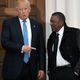 Then-President-elect Donald Trump greets Robert Johnson, the founder of Black Entertainment Television, at Trump International Golf Club on Nov. 20, 2016, in Bedminster Township, N.J.